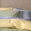 Påslakanset i satin ljusgul - 150x210 cm